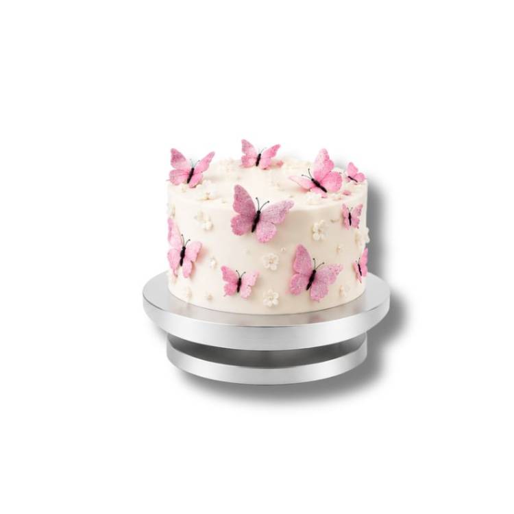 Nejedlá dekorace ve tvaru růžových motýlků s třpytivým povrchem na zdobení dortů a cupcakes