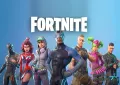 Jedlý obrázek na dort s postavami z Fortnite, uprostřed Carbide, na modrém pozadí s nápisem Fortnite, hranatý formát.