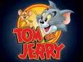 Kocour Tom a myška Jerry na modrém pozadí se žlutým kruhem a červeným nápisem, jedlý obrázek na dort