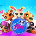 Kulatý jedlý obrázek na dort s postavičkami Littlest Pet Shop, pandou s kazeťákem, žirafou a modrým logem na tyrkysovém pozadí