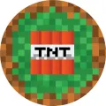Kulatý jedlý obrázek s červenou pixelovou kostkou TNT s černým nápisem na zeleném travnatém bloku s hnědým okrajem, obrázek na dort