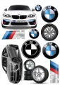 Jedlý obrázek na dort s bílým sportovním BMW, šedým kupé, koly a logy značky v modro-bílých barvách.