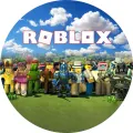 Kulatý jedlý obrázek na dort: skupina pestrých postaviček Roblox na zelené louce pod modrou oblohou s bílými mráčky a nápisem ROBLOX