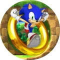 Modrý ježek Sonic skáče skrz zlatý kruh na zelené louce, jedlý obrázek na dort