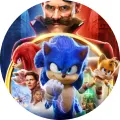 Kulatý jedlý obrázek s ježkem Sonicem, lišákem Tailsem a Dr. Robotnikem v dynamické scéně, barevný, jedlý obrázek na dort