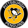 Kulatý žluto-černý jedlý obrázek s bruslícím tučňákem s hokejkou z Pittsburghu, s nápisem klubu, jedlý obrázek na dort