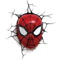 Kulatý jedlý obrázek na dort: rudá maska Spidermana s černou pavučinou a bílýma očima, kolem tmavé praskliny ve zdi, jedlý obrázek na dort