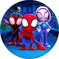 Kulatý jedlý obrázek na dort: Spiderman v červenomodrém kostýmu mezi dvěma hrdiny na pozadí tmavě modré noční ulice s osvětlenými okny, jedl