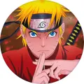 Naruto v červeném plášti s mečem na tmavém pozadí s jiskrami, kulatý jedlý obrázek na dort