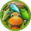 Kulatý jedlý obrázek s čtyřmi barevnými dinosaury, za nimi jede vláček mezi květinami, jedlý obrázek na dort