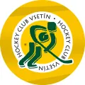 Kulatý zlatý obrázek se zelenou siluetou hokejisty s holí a nápisem Hockey Club Vsetín, jedlý obrázek na dort