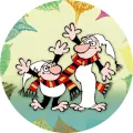 Křemílek a Vochomůrka sdílejí jednu pruhovanou šálu na zeleném pozadí s listy, jedlý obrázek na dort