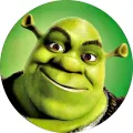 Shrek s dlouhými ušima a spokojeným výrazem na zeleném pozadí, kulatý jedlý obrázek na dort