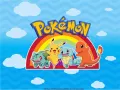 Jedlý obrázek na dort s pokémony Pikachu, Charmander, Squirtle a Bulbasaur pod duhou na modrém pozadí s obláčky