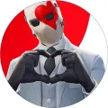 Herní postava Fortnite v bílém obleku s maskou a srdcem z prstů na červeno-bílém pozadí, jedlý obrázek na dort