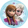 Anna a Elsa z Ledového království na kulatém obrázku s bílo-fialovým ornamentem na modrém pozadí, jedlý obrázek na dort