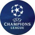 Kulatý jedlý obrázek s bílým fotbalovým míčem z hvězd a nápisem UEFA Champions League na tmavě modrém pozadí, jedlý obrázek na dort