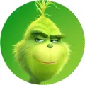 Detailní zelený obličej usmívajícího se Grinche, kulatý jedlý obrázek na dort