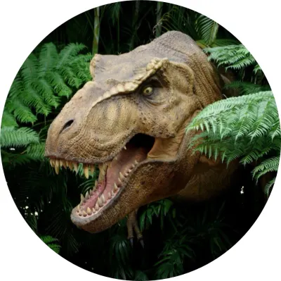 Dinosaur – Hlava T-Rexa v zeleném pralese – jedlý papír na dort