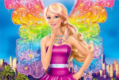 Barbie – víla s duhovými křídly nad městem – obdélníkový jedlý papír na dort