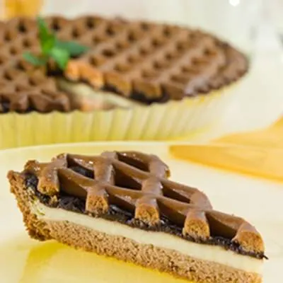 Čokoládová náplň Corra od značky Zeelandia v balení 1 kg, vhodná na plnění a zdobení dortů a cukrářských výrobků