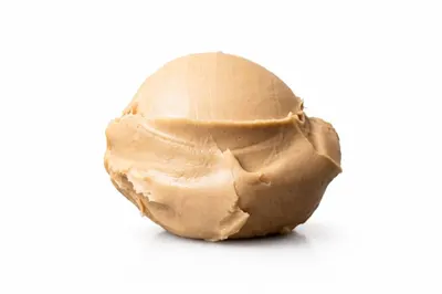 Lískooříšková ganache Bakels s příchutí lískových ořechů v balení 500 g pro plnění a zdobení dortů