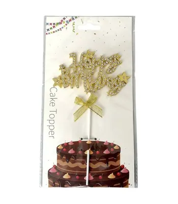 Zlatý zápich do dortu s nápisem Happy Birthday a dekorativní mašlí na narozeninový dort