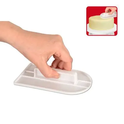 Žehlička Orion na uhlazování fondánu a marcipánu při potahování dortů