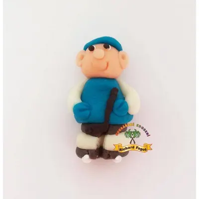 Figurka hokejisty v modrém dresu z kokosové hmoty na dort, značka Fagoš, výška 6 cm