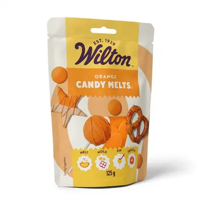 Cukrářská poleva Candy Melts oranžová od značky Wilton v balení 125 g na zdobení dortů a sladkostí