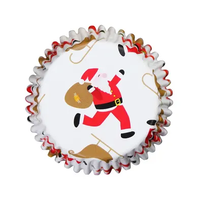 Vánoční papírové košíčky na muffiny Wilton s motivem Santa a saní a alobalovým vnitřkem, balení 30 kusů