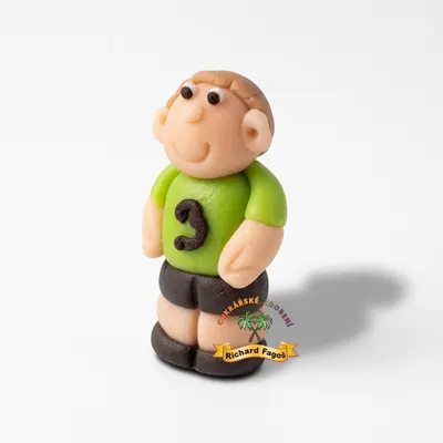Jedlá figurka fotbalisty v zeleném dresu z kokosové hmoty na dort, výška 6 cm, značka Fagoš