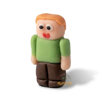 Jedlá figurka Alexe z Minecraftu z kokosové hmoty od značky Fagoš na dekoraci dortu