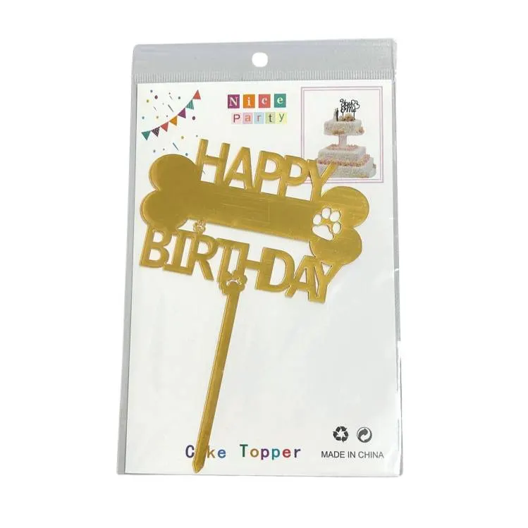 Zlatý zápich do dortu s nápisem Happy Birthday a motivem kosti a tlapek pro milovníky psů