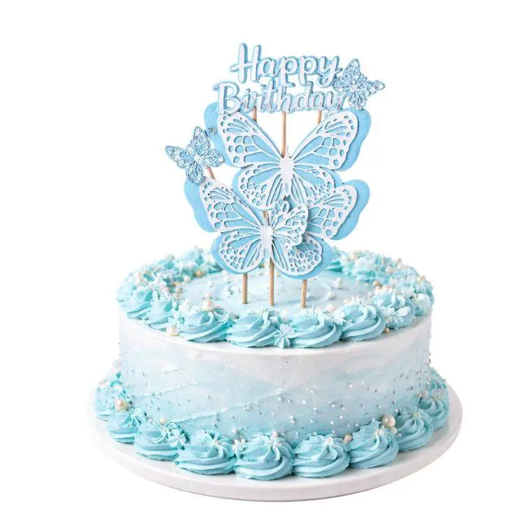Modré zápichy do dortu s motýlky a nápisem Happy Birthday, balení 4 kusů