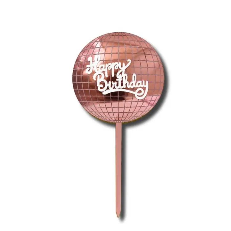 Plastový růžový zápich ve tvaru diskokoule s nápisem Happy Birthday na dort nebo cupcakes