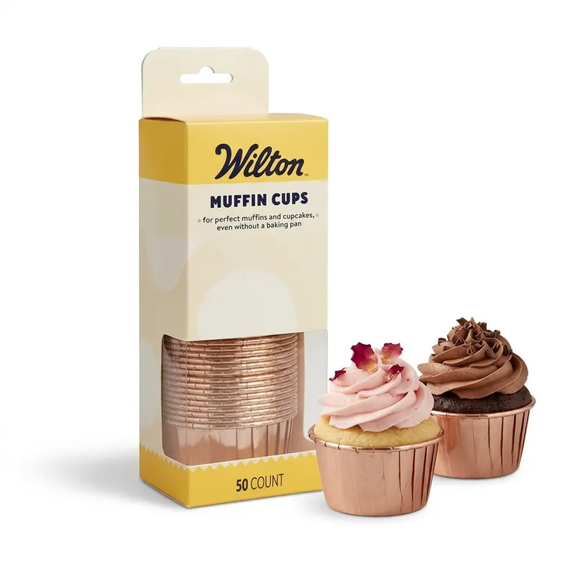 Metalické košíčky na muffiny Wilton v odstínu rose gold, balení 50 kusů, pro pečení a servírování dezertů