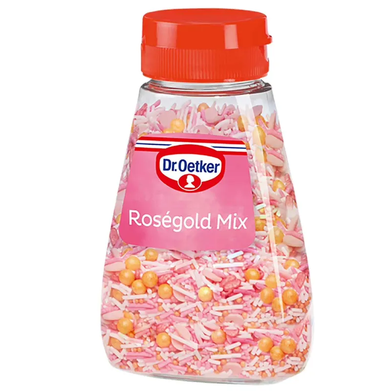 Směs cukrářského sypání v odstínech rose gold s hvězdičkami a perličkami na dekorování dortů a dezertů od značky Dr. Oetker