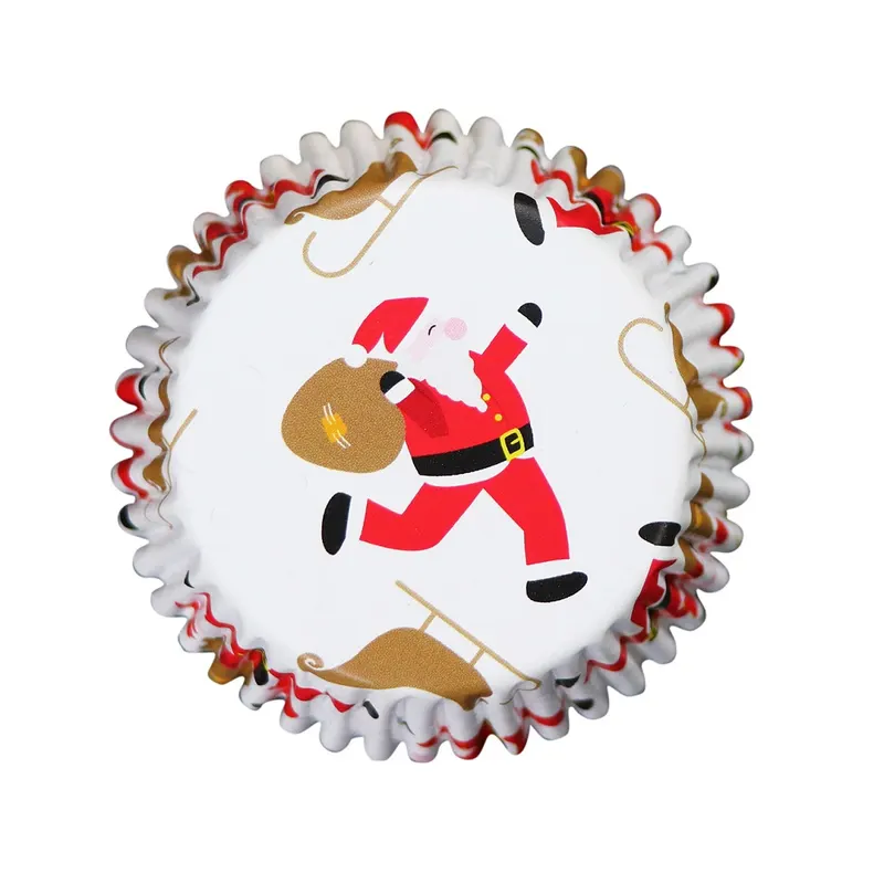 Vánoční papírové košíčky na muffiny Wilton s motivem Santa a saní a alobalovým vnitřkem, balení 30 kusů