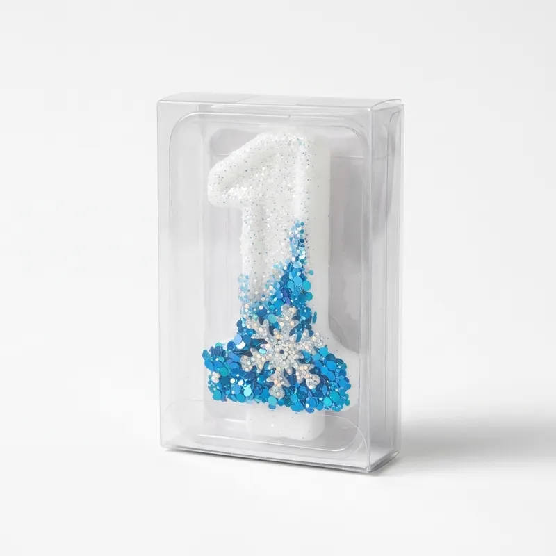 Bílo-modrá svíčka Frozen se sněhovou vločkou a číslem 1 na dort